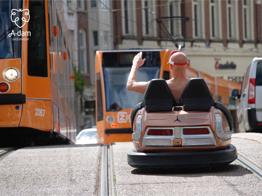 Man drives bumper car through the streets of Amsterdam in his